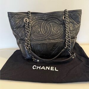 Authentic Chanel Black Quilted Logo Tote
With Chain Handles